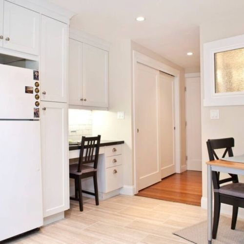 High-end hot dual plate and convection oven, custom cabinets, granite counter top, dishwasher, and Keurig coffee machine with free coffee.