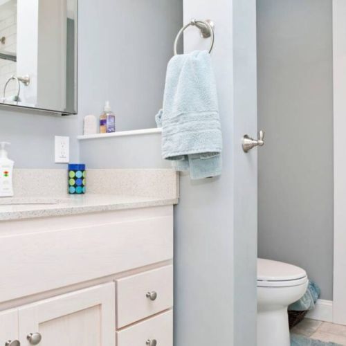 Full bathroom, including soap, shampoo, conditioner, hair dryer, misc toiletries
