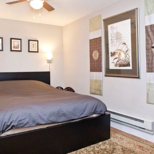 Bedroom includes queen size bed, dresser, night tables, and closet.