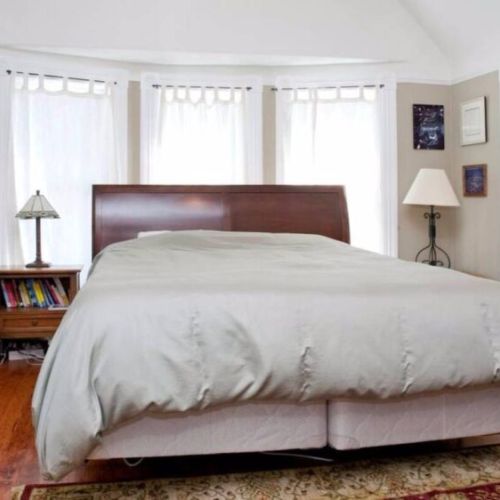 Bedroom #1 - "The Master Bedroom" with a California King bed.  Thanks to the pandemic, there is now a desk to the left of the bed.