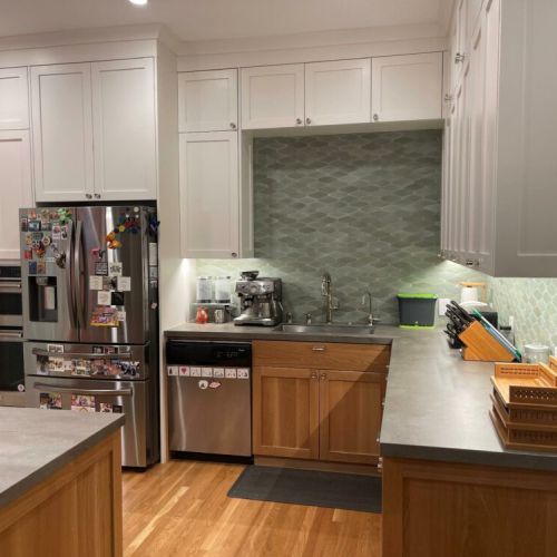 In 2021, our kitchen and dining room was just renovated down to the studs.  It has a new, modern, open feel, yet still retains the style and charm of an old Edwardian.  We have a fully-stocked kitchen, with brand new stove, oven, fridge, and high-end cabinets.