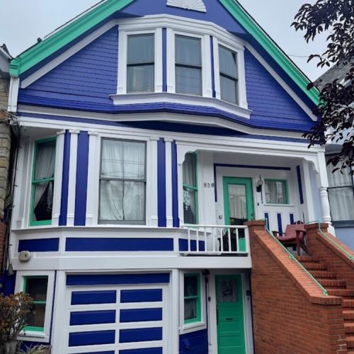 Our turn-of-the century Edwardian home. Your entrance is through the green door on the ground level.