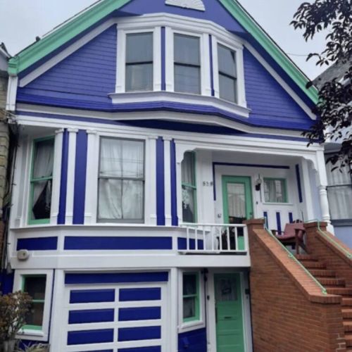 Our beautiful Edwardian turn-of-the-century home! Your entrance is the main entrance up the brick stairs.  (We have a separate in-law unit, whose entrance is through the garage.)